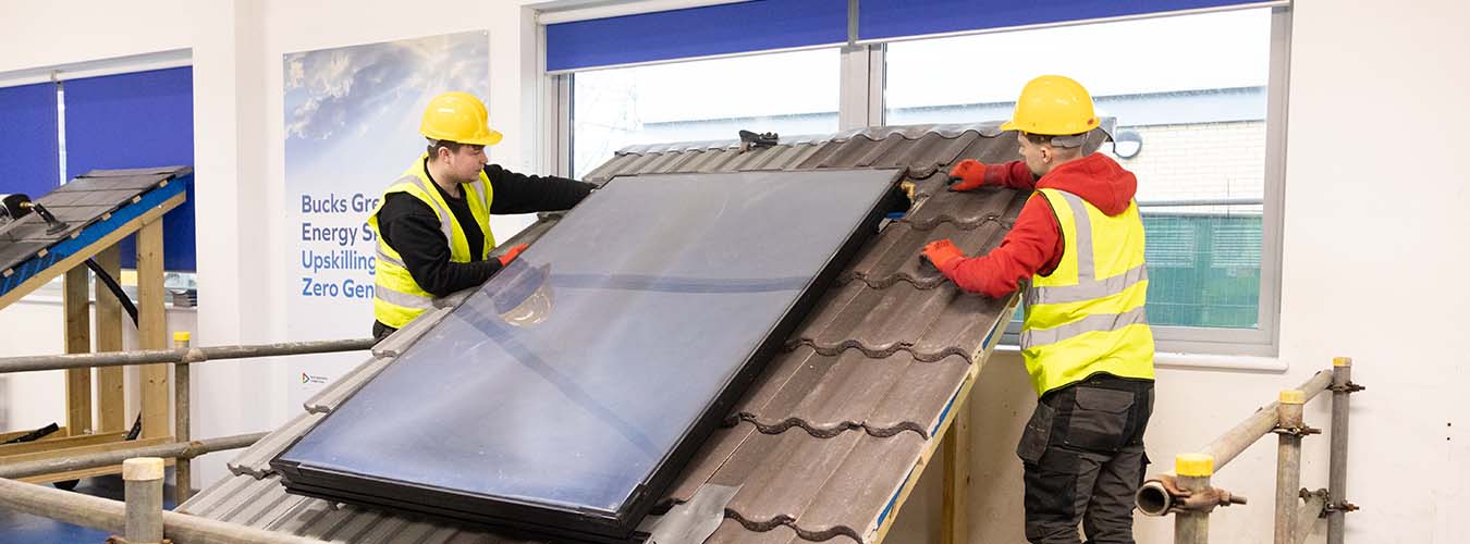 Students with solar panel 